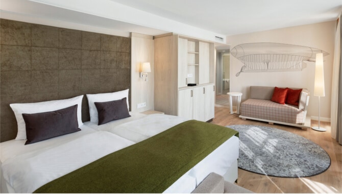Neue-Deluxe-Junior-Suite-Bett-und-Couch