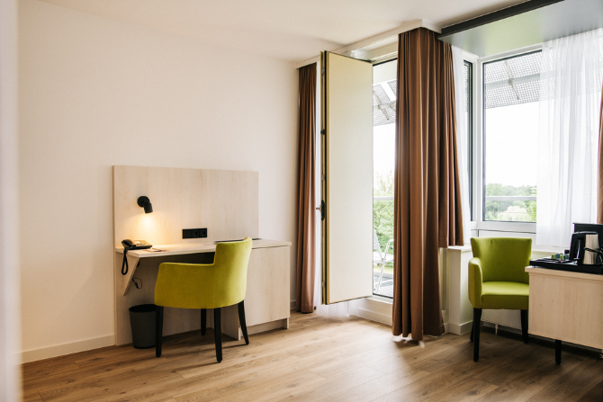 Wohnraum von unserer Junior Suite im Kongresshotel Potsdam.