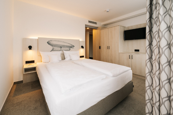 Geräumige Betten in den Studios des Kongresshotels Potsdam.