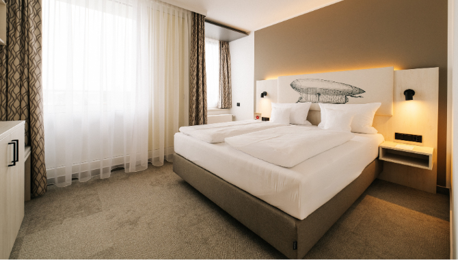 Geräumige Betten in den Studios des Kongresshotels Potsdam.